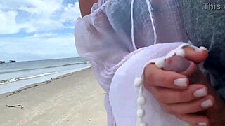 A crazy MILF jerks me off right in front of passersby, turning heads.